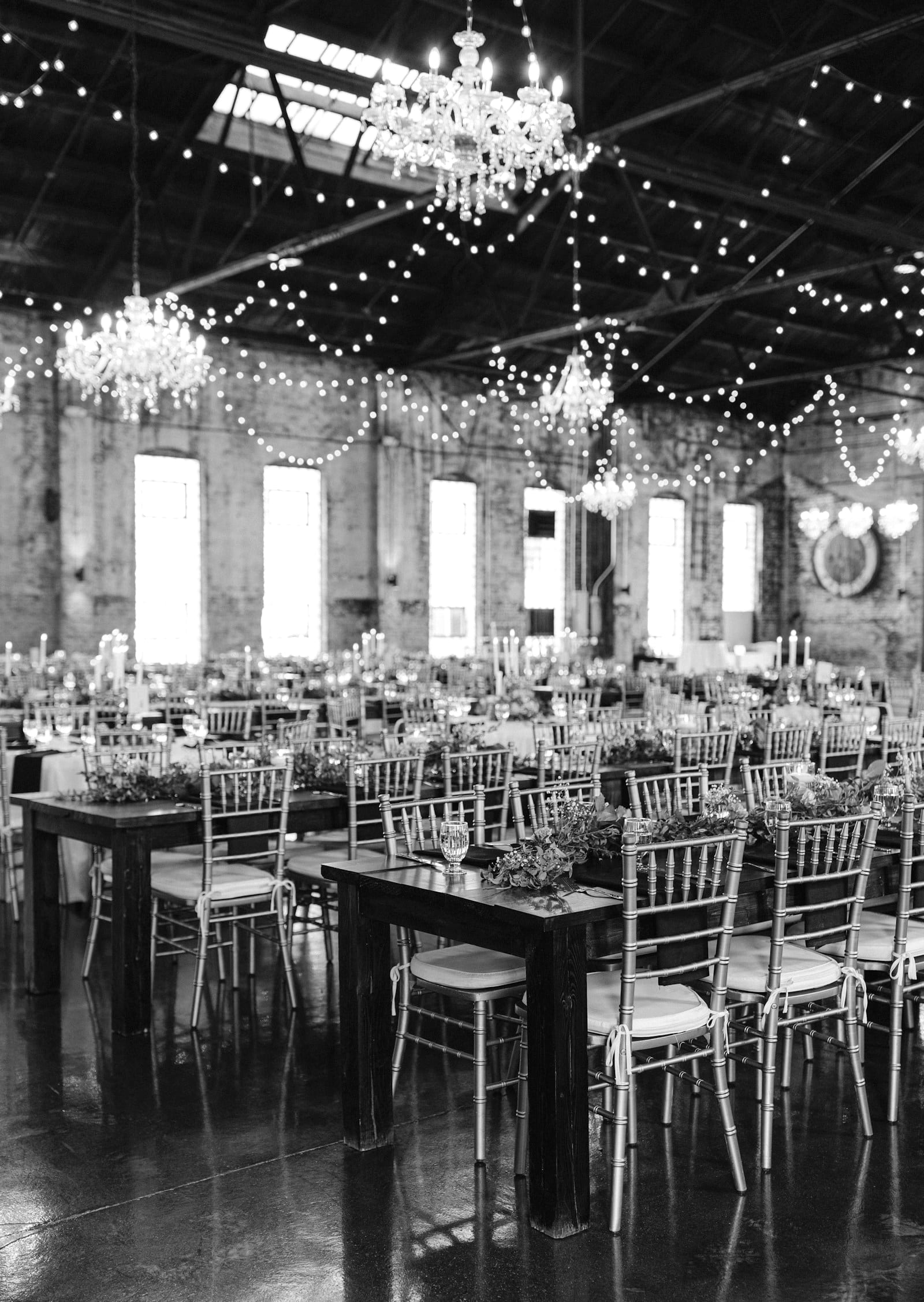 Elegant wedding reception styled by Magool Affairs, with string lights and set tables